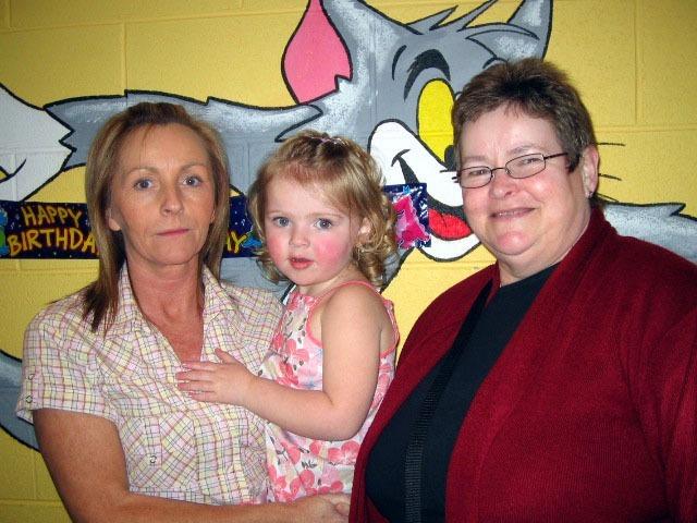 Birthday girl Zoe celebrates her 3rd birthday with Granny Helen and Granny Anne 0083JML : Parties in Derry in Spring 2006.