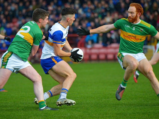 Errigal Ciaran’s Cormac Quinn is challenged by and Glen pair Conor Convery and Conor Glass during the Ulster Senior Club Championship quarter- final in Celtic Park on Sunday. Photo: George Sweeney. DER2246GS – 19
