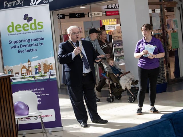 ONE STOP SHOP FOR DEMENTIA AT FOYLESIDE. . . .The Deputy Mayor, Darren Guy addressing the public at Foyleside during Friday's One Stop Shop for Demential Information Day. On right is Eilish Brown, DEEDS/OLT.
