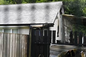 Damage to the rear of a house on Lecky Road. Photo: George Sweeney