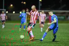 Liam Boyce goes at the Waterford Fc defence at Brandywell on Friday night.