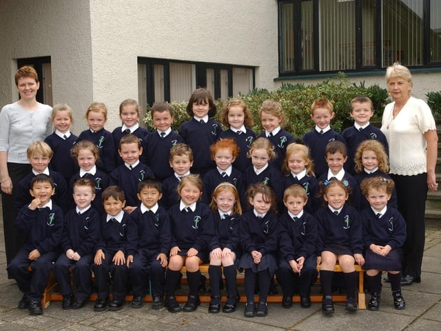 Primary 1 pupils from Good Shepard Primary School, pictured with Michaela Grant, left, teacher, and Pamela Connell, classroom assistant. (1909PG04):20 years on: Young people across Derry and Donegal starting school in September 2003