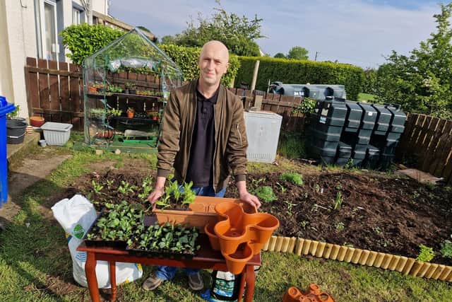 Getting containers ready to be moved to the front garden.