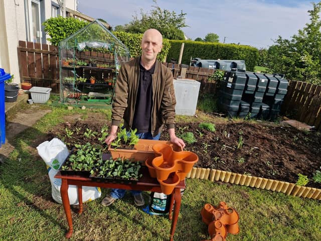 Getting containers ready to be moved to the front garden.