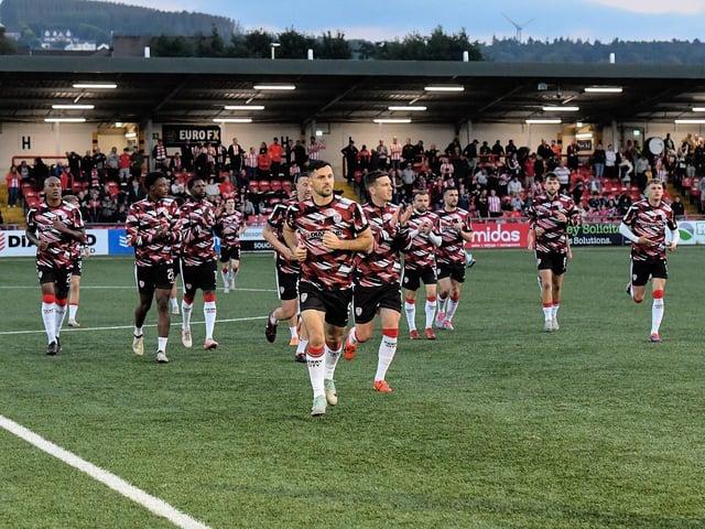 Derry City players return to the changing rooms after their warm-up. Photograph: George Sweeney