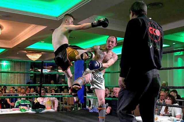 Rathmor Warrior’s Conal McBrearty (left) defeated CJ Silcock, Fightclub NI, to win the All Ireland 66kg K1 Title, on Saturday evening last, in the Everglades Hotel. Photo: George Sweeney.  DER2312GS – 77
