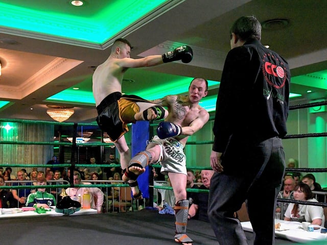 Rathmor Warrior’s Conal McBrearty (left) defeated CJ Silcock, Fightclub NI, to win the All Ireland 66kg K1 Title, on Saturday evening last, in the Everglades Hotel. Photo: George Sweeney. DER2312GS – 77