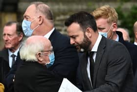 President Michael D Higgins condoles with SDLP Leader Colum Eastwood at the Funeral of Pat Hume in 2021. Pic Colm Lenaghan/Pacemaker