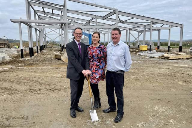 Education Permanent Secretary, Dr Mark Browne, cutting the sod at the new £7.2million Gaelscoil Uí Dhochartaigh in Strabane along with Principal, Maire Ni Dhochartaigh and Chairperson of Governors, Colman Mac an Chrosain.