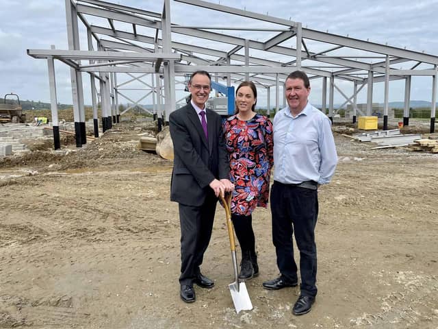 Education Permanent Secretary, Dr Mark Browne, cutting the sod at the new £7.2million Gaelscoil Uí Dhochartaigh in Strabane along with Principal, Maire Ni Dhochartaigh and Chairperson of Governors, Colman Mac an Chrosain.