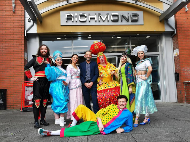 Richmond Shopping Centre manager Bobby Nicholson with the cast members of the Aladdin pantomime during Santa’s visit to the centre on Saturday morning. Photo: George Sweeney