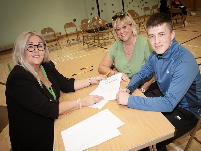 St. Joseph's Boys' School Principal, Mrs. Ciara Deane pictured with GCSE student Darragh O'Kane and his mum Margaret at the school on Thursday. (Photos: Jim McCafferty Photography)
