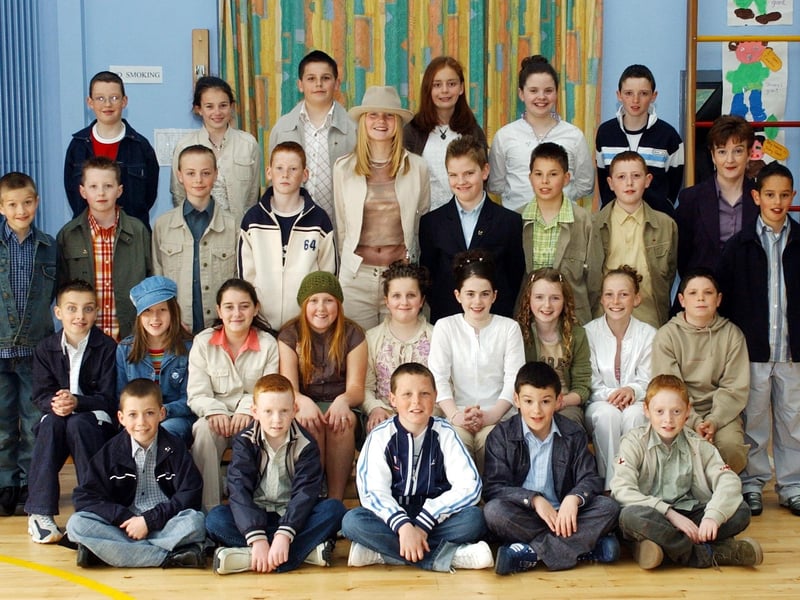 Pupils from St. Eithne's Primary School who were confirmed by Most Rev. Dr Francis Lagan, Auxiliary Bishop of Derry in Holy Family Church, Ballymagroarty. Included is Mrs Leona McCusker, teacher.