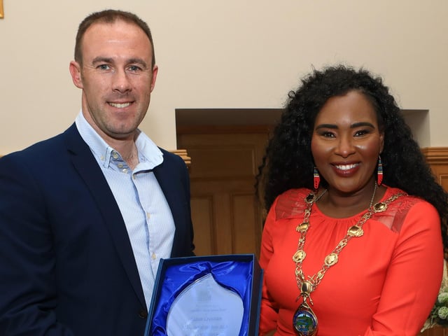 Mayor of Derry City and Strabane District Council, Councillor Lilian Barr, makes a presentation to Aidan McCrossan "Families First NI Education Award NI Teacher of the Year 2024" at a reception for Knockavoe School held in the Mayor's Parlour. (Photo - Tom Heaney, nwpresspics)