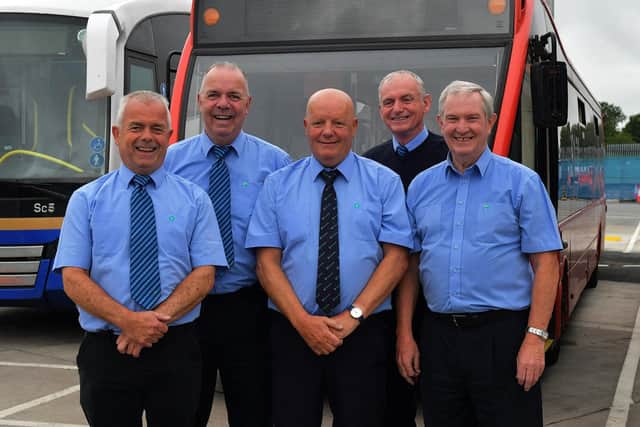 Pictured at Pennyburn Depot are Translink retirees who accumulated 183 years of service. From left are Vinnie Morrison (45 years), Andy McGillan (35 years), George Curry (50 years), Trever Tracey (17 years) and Jim Kelly (36 years). Photo: George Sweeney. DER2326GS - 63