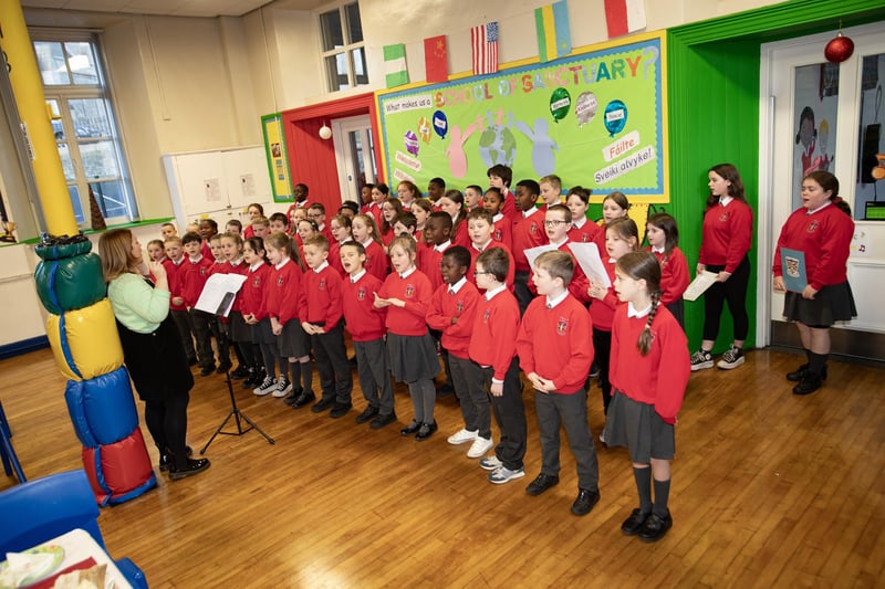 St Eugene' s School Choir entertain the visitors at Monday's event.