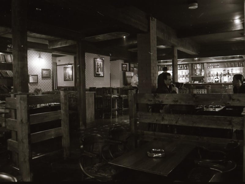 Customers and staff at Doherty's bar beside Castle Gate in Derry city centre.