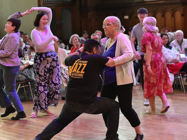 Revellers dance to the music of The Roaring Forties swing and rock 'n' roll band in the Guildhall during the City of Derry Jazz Festival.  Photo: George Sweeney