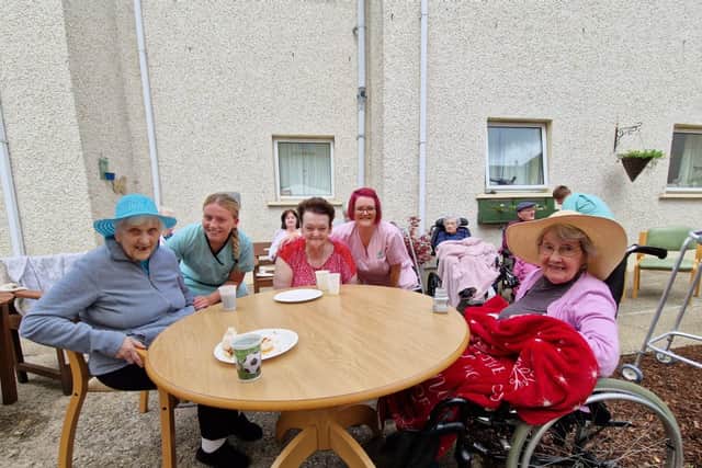 Nora, Caitlin Janet, Gillian and Joan enjoying the summer barbeque in Ardlough Care Home.