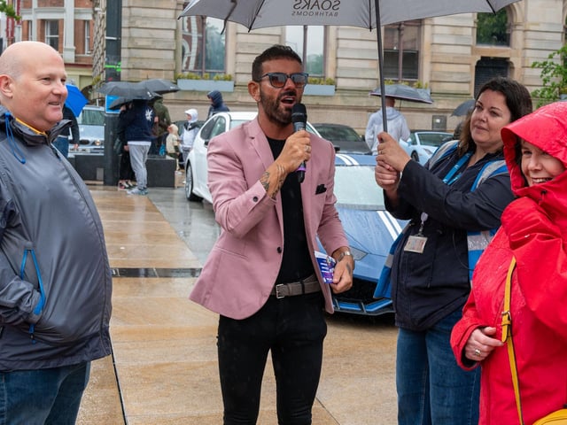 Michael Doherty takes the microphone to the public during Supercar Saturday.
Derry City and Strabane District Council Mayor, Councillor Lilian Seenoi-Barr has hosted Supercar Saturday in Guildhall Square to raise money for the Mayoral Charity Bud Club. The event attracted car enthusiasts and owners from across the region to support aid the local charity. Picture Martin McKeown. 24.05.25