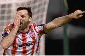 Patrick Hoban with his trademark celebration after finding the net for Derry City. Photo by Stephen McCarthy/Sportsfile