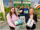 Photographed is Lisa Storey and Deirdre Cassidy from Altnagelvin Parents Group, Mayor Sandra Duffy and Emer Rabbett.  Accepting the donation is Michelle Bryson Lead Nurse Acute Paediatrics and Sharon O’Donnell Deputy Sister Ward 16.