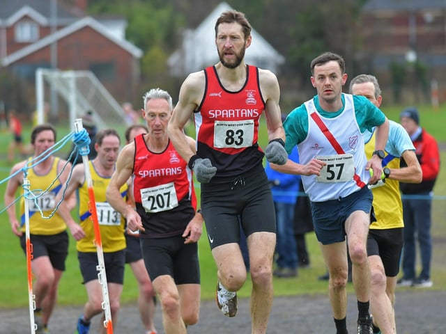 Spartans Colin Roberts (207) and Stephen Jamison (83) competing in the Spartans open cross country 6k race at Thornhill College on Saturday. Photo: George Sweeney