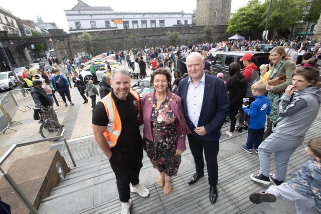 The Mayor, Patricia Logue and husband James pictured with Supercar organiser Gary McCaul in Guildhall Square on Saturday. (Photos: Jim McCafferty Photography)