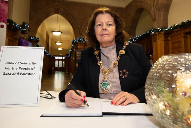 Derry City and Strabane District Council Mayor, Councillor Patricia Logue pictured as she opened a Book of Solidarity for the People of Gaza and Palestine in the Guildhall. Picture Martin McKeown. 21.12.23