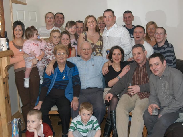 Friends and family celebrating Donna's birthday at home.