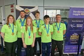 TOP OF THE WORLD . . . UKF medallists at the WUKF World Karate Championship, from left, Erin McCole (gold), Killian Doherty (bronze x2), Bebhinn McCole (bronze), PJ Moynihan (gold and bronze), Michael Gill