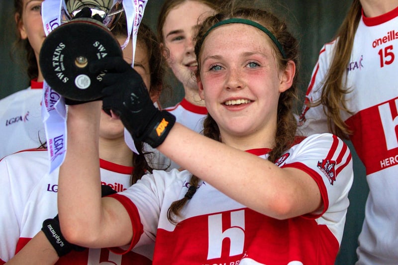 Derry captain Aine Young lifts the cup after the 2023 All-Ireland U14 Gold Final at Clan na Gael GAA Club in Dundalk, Louth. Photo by Stephen Marken/Sportsfile