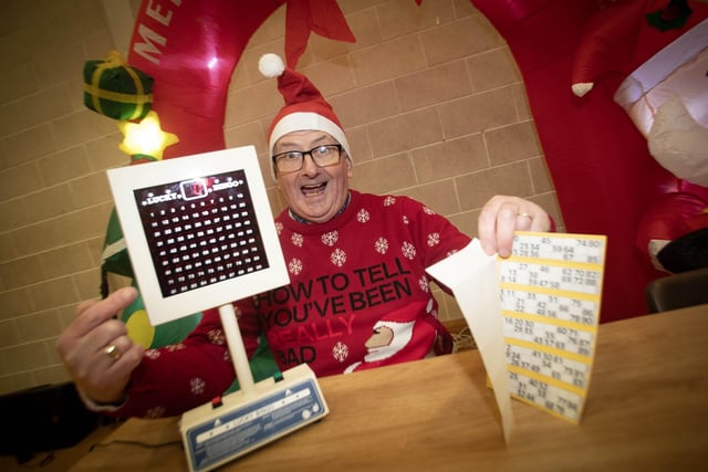 Spasy McGilloway, an OLT regular steals Micky Doherty's limelight at Wednesday's Christmas Bingo. (Photo: JIm McCafferty Photography) : .