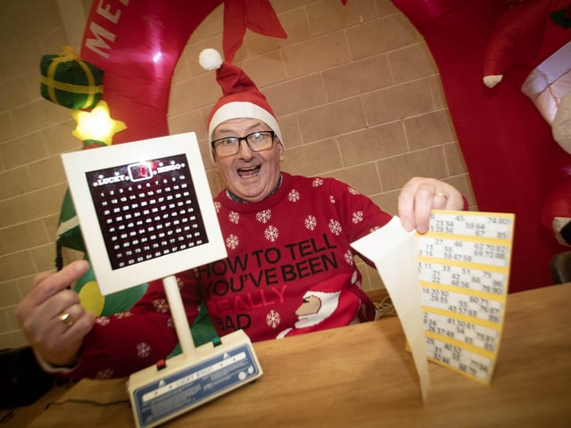 Spasy McGilloway, an OLT regular steals Micky Doherty's limelight at Wednesday's Christmas Bingo. (Photo: JIm McCafferty Photography) : .