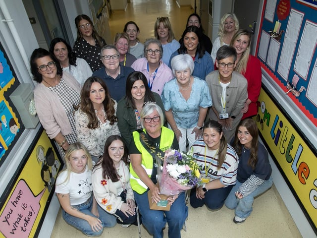 Mrs. Christine Slevin pictured with her band of classroom assistants at the Model PS this week. (Photos: Jim McCafferty Photography)