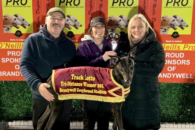 Track Lotto Tri-Distance-Final winner 'Finnside Gem' with Joseph White and his wife Lorna (centre) receiving their trophy from Mairead Miller, Track Lotto.