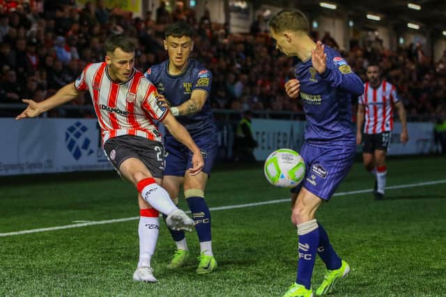Derry striker Danny Mullen gets in a cross in the second half.