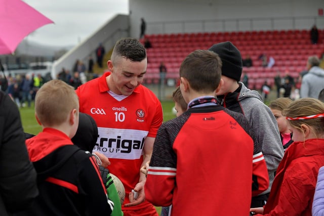 Niall Toner signs autographs after Derry’s victory over Clare at Owenbeg on Sunday afternoon. Photo: George Sweeney. DER2312GS - 16