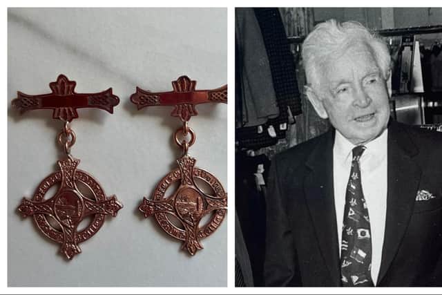 A pair of Derry Feis medals from the 1930s which were won by the late Larry Hasson, the former owner of Austins. Born in 1910, Larry Hasson was 101 years old when he passed away in 2011. Having never formally retired, he was still working in Austins past his 100th birthday.