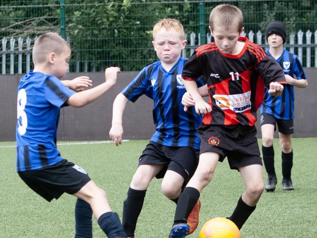 Action from one of the group games between Oxford United and Phoenix Athletic.