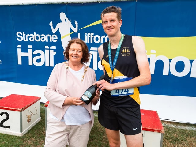 Mayor of Derry City and Strabane District Council, Councillor Patricia Logue with men's winner Philip McHugh of Letterkenny AC. (Photo: Karol McGonigle)