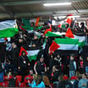 October 2023, fans display solidarity with people of Gaza and Palestine at Derry City's game against Shelbourne at the Brandywell. Photo: George Sweeney