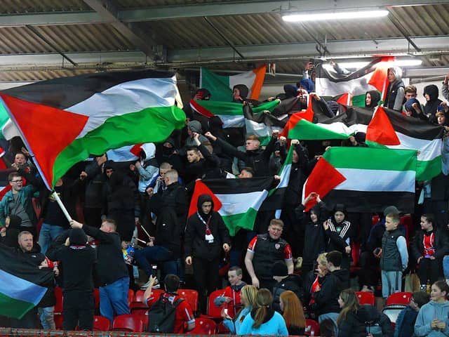 October 2023, fans display solidarity with people of Gaza and Palestine at Derry City's game against Shelbourne at the Brandywell. Photo: George Sweeney