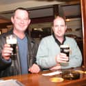Enjoying a pint of stout in The Delacroix in January 2004.