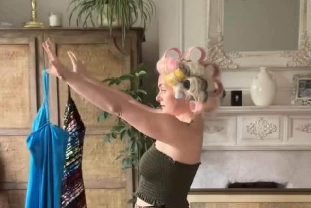 Laura McCourt shows off her thrifted looks on TikTok.
