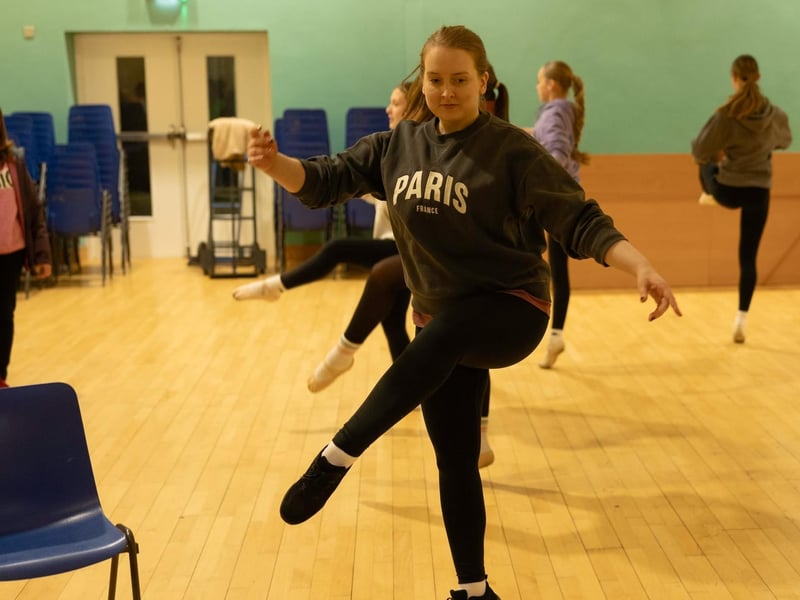 Members of the ensemble in rehearsal for Oklahoma.