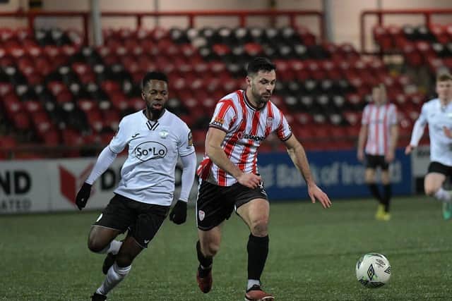 Derry City’s Pat Hoban holds off Noe Baba of Finn Harps at the Brandywell on Friday evening. Photograph: George Sweeney