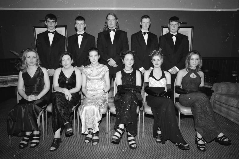 Seated, from left, Anne Coyle, Teresa McLaughlin, Lydia Cunningham, Breedge Doherty, Clodagh Callaghan and Helena Harkin. Standing, from left,  Ciaran Kelly, John Doherty, Ciaran McGonagle, Jim Doherty and Hugh Doherty. Pictured at the Carndonagh Community School formal in January 1998.
