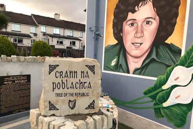 The commemorative garden at the corner of Rinmore Gardens and Lislane Drive and the mural of George McBrearty.