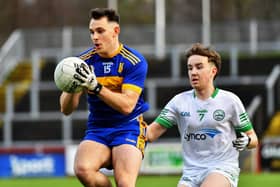Noamh Padraig's Caolan McColgan shields the ball from Craigbane's James McLaughlin during Saturday's final. Photo: George Sweeney